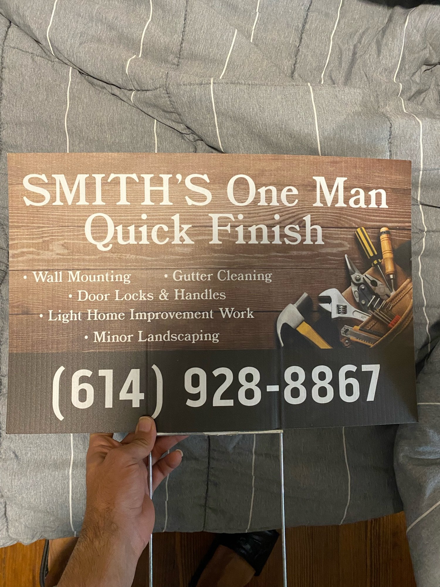 Smith's One Man Quick Finish Logo