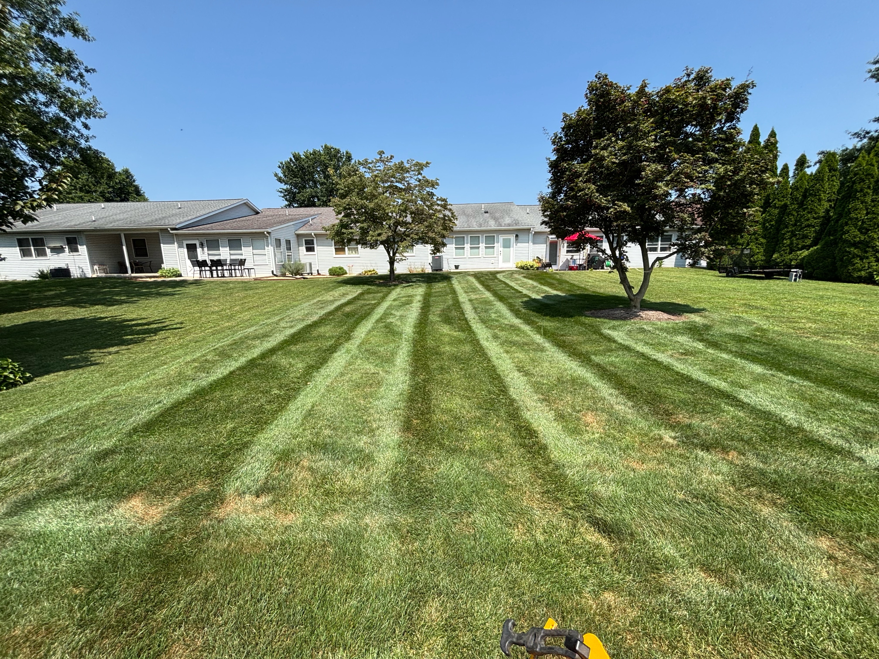 Backyard Acres Lawncare, LLC Logo