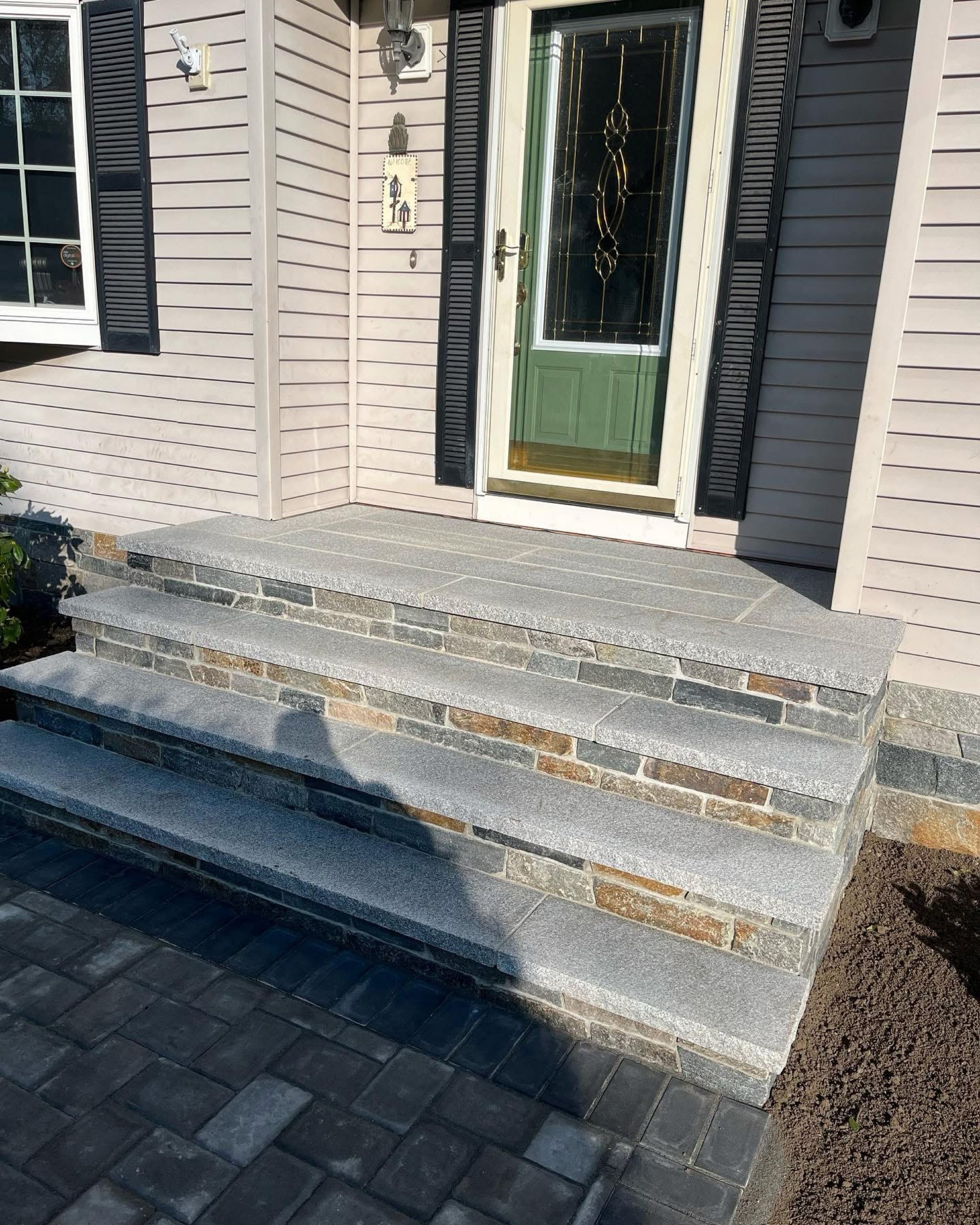 OTONIEL LANDSCAPING & MASONRY INC Logo
