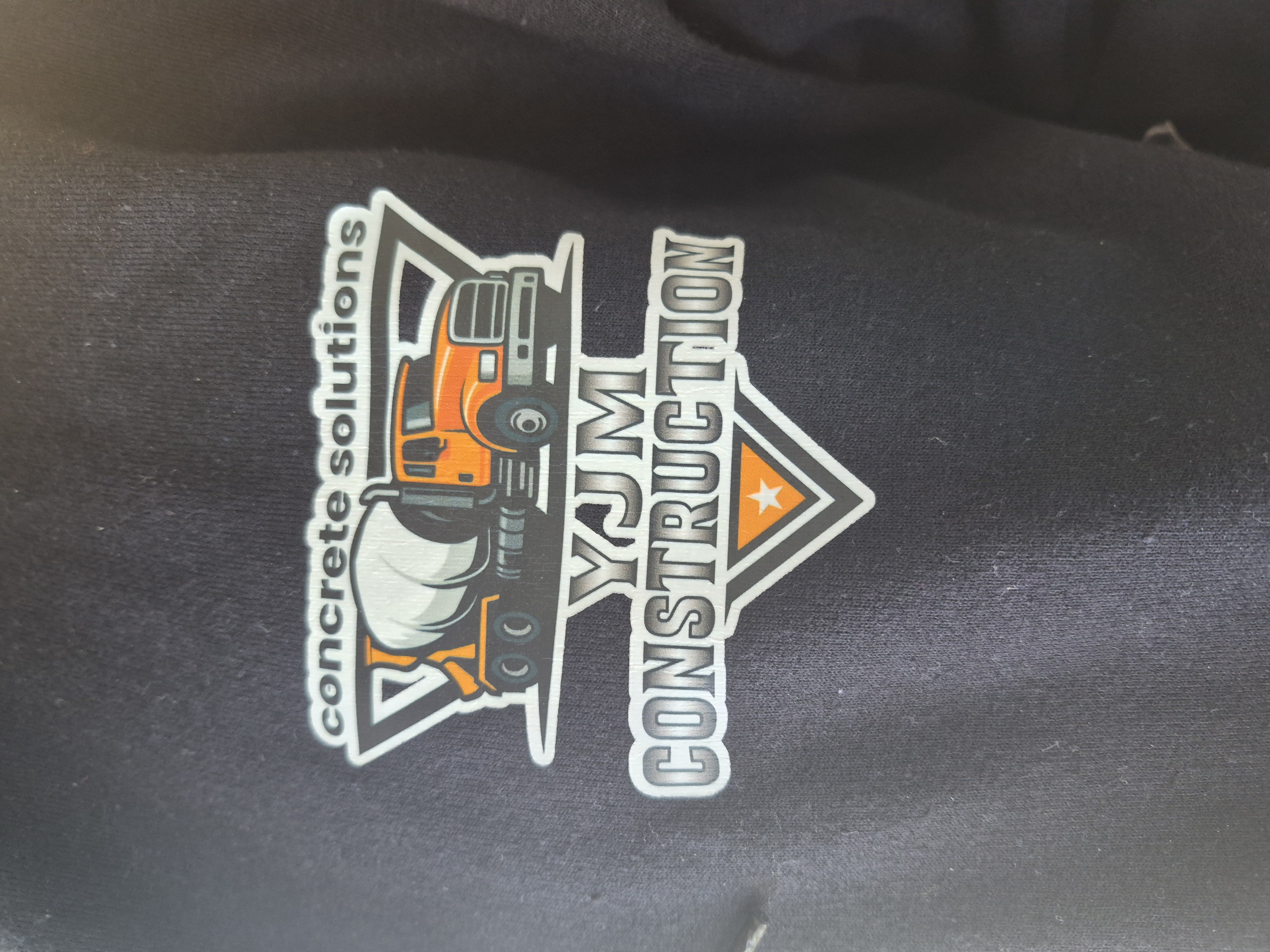 YJM Construction Logo