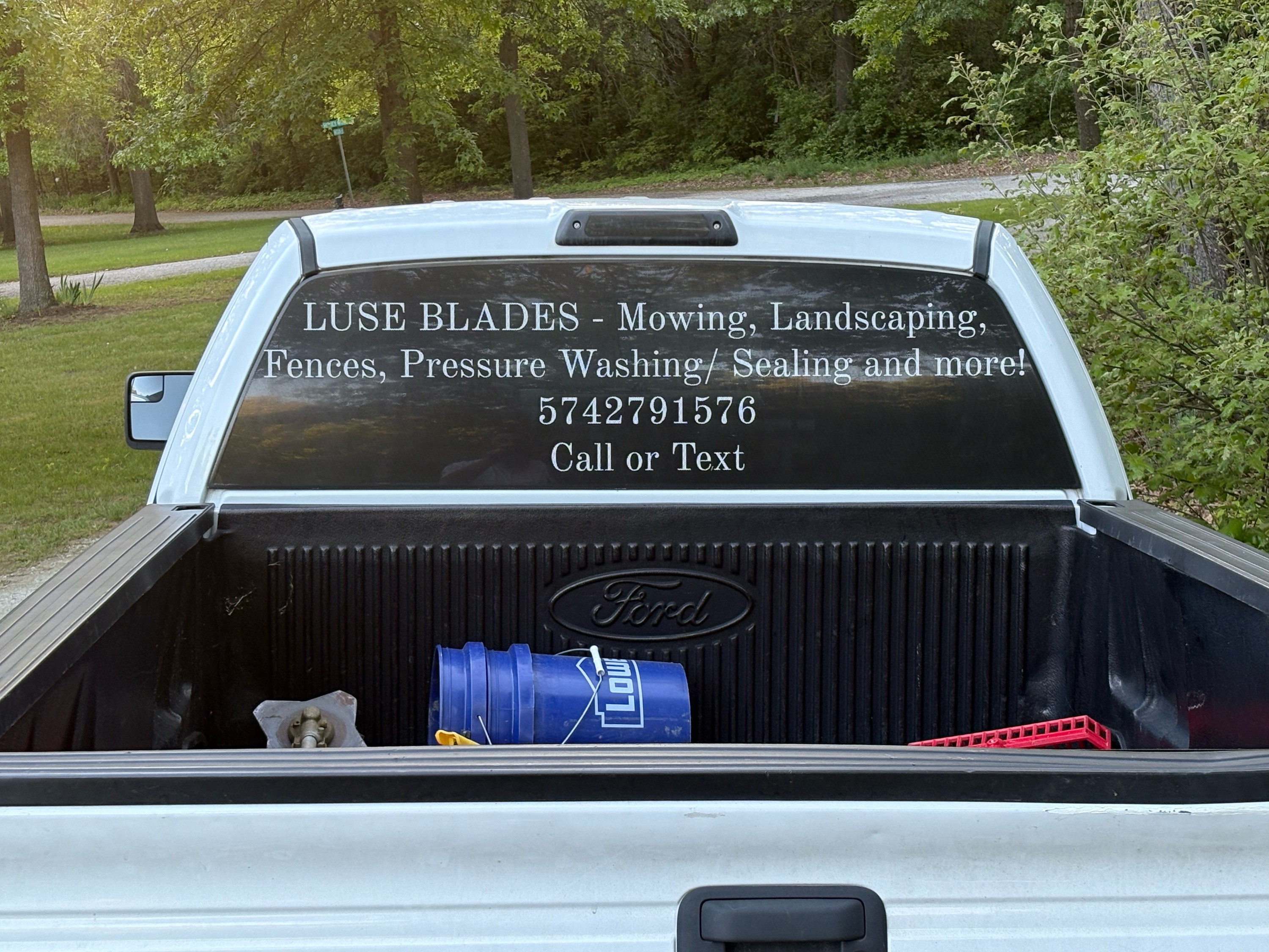 Luse Blades Lawn Care and Landscaping Logo