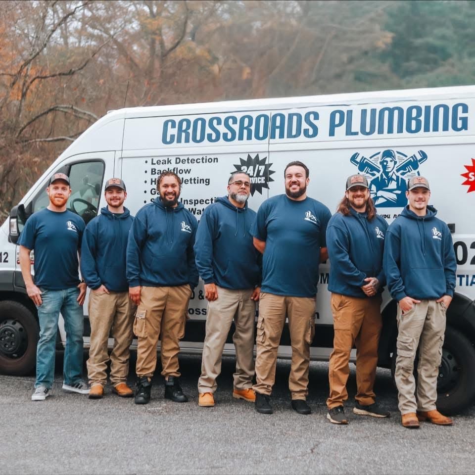 Crossroads Plumbing & Renovations Logo