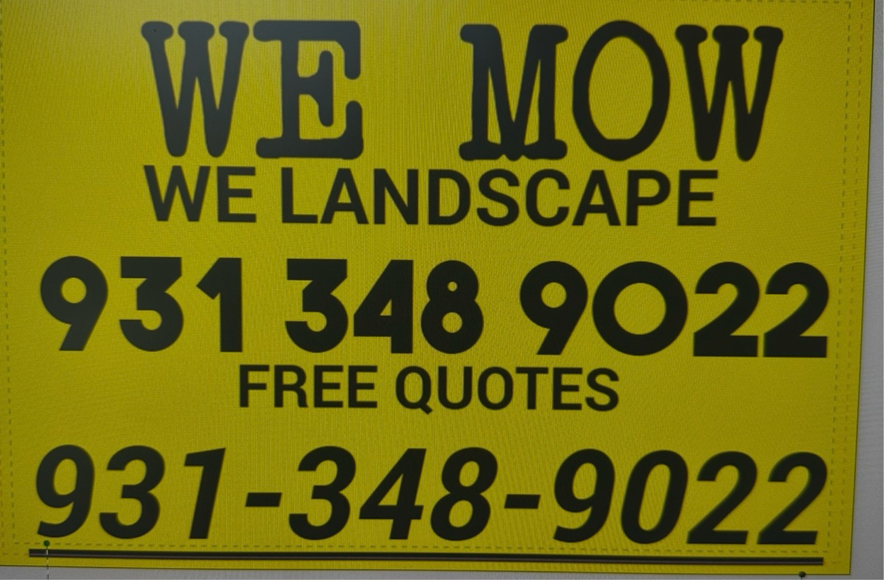 WE MOW Logo