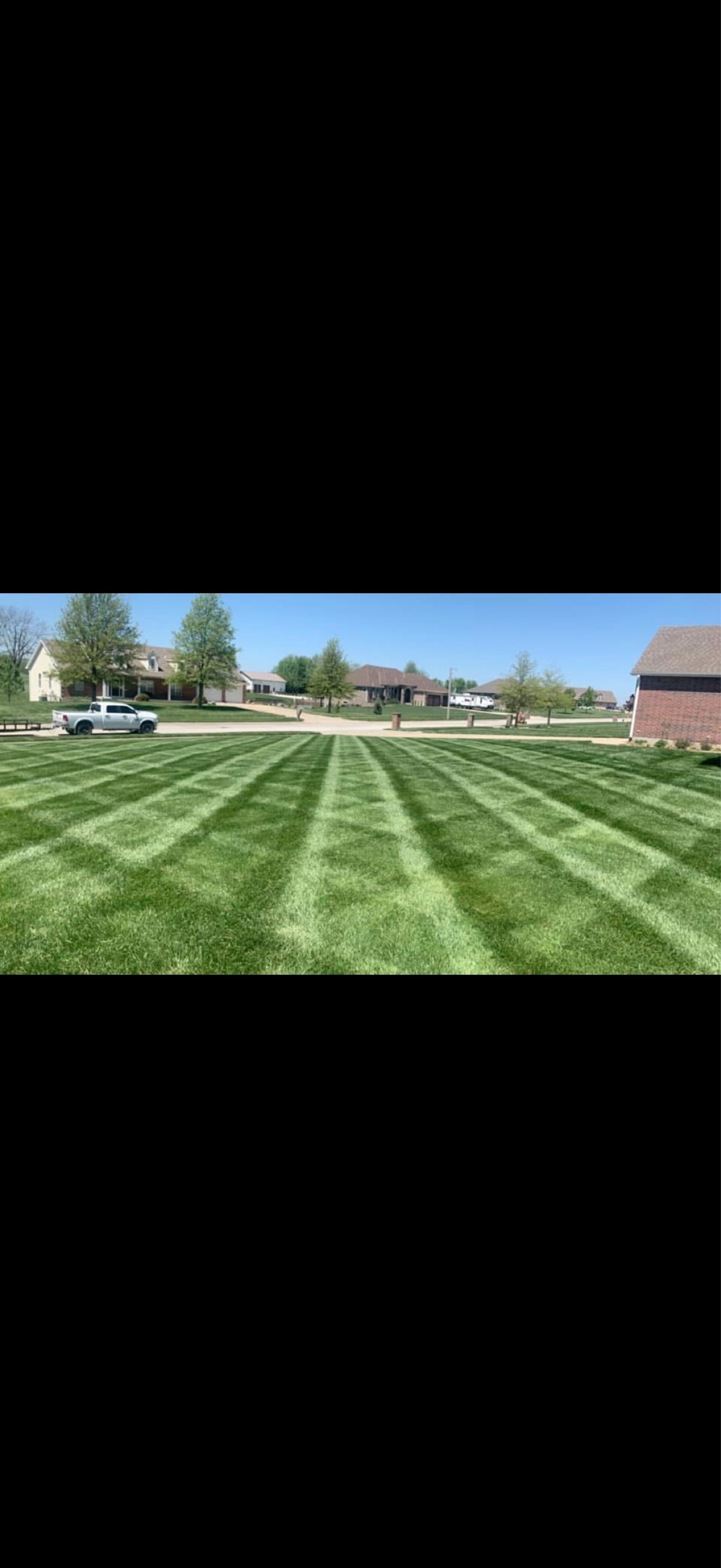 Prestige Lawn Care Logo