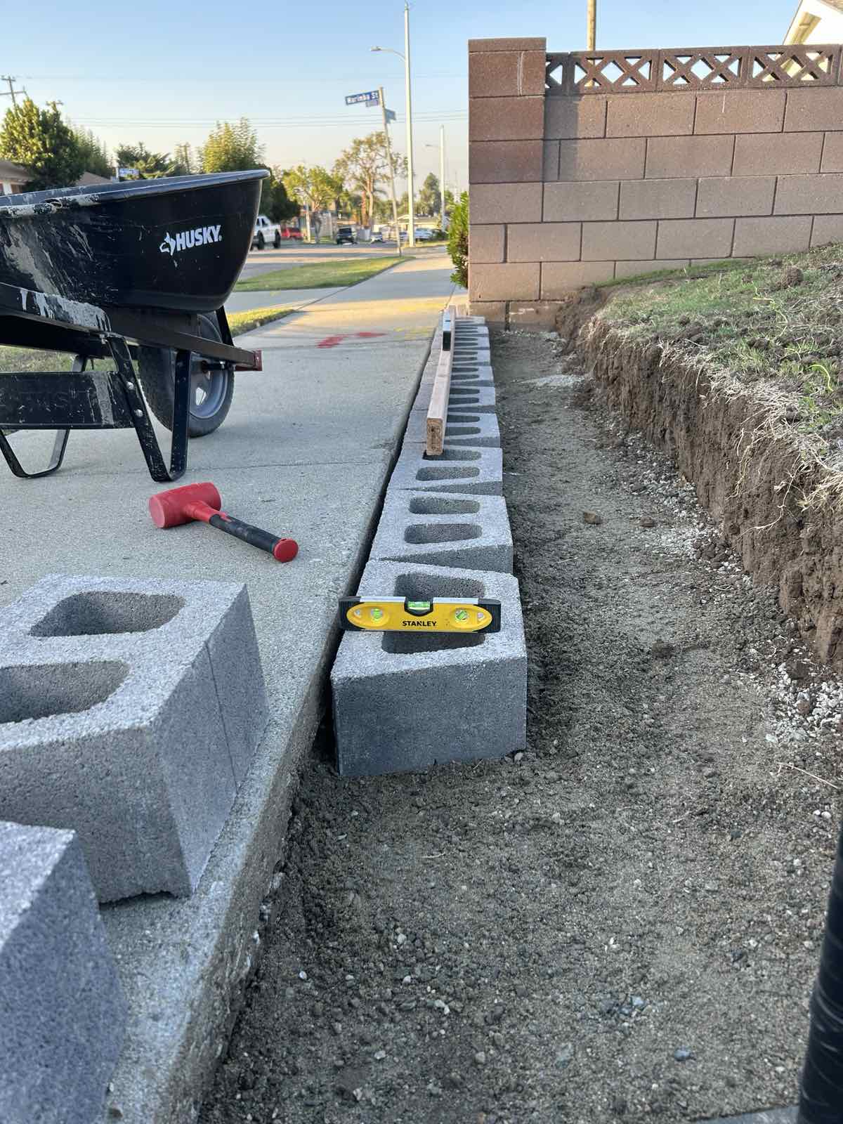 ALPINE MEADOWS LANDSCAPING AND CONSTRUCTION CORP Logo