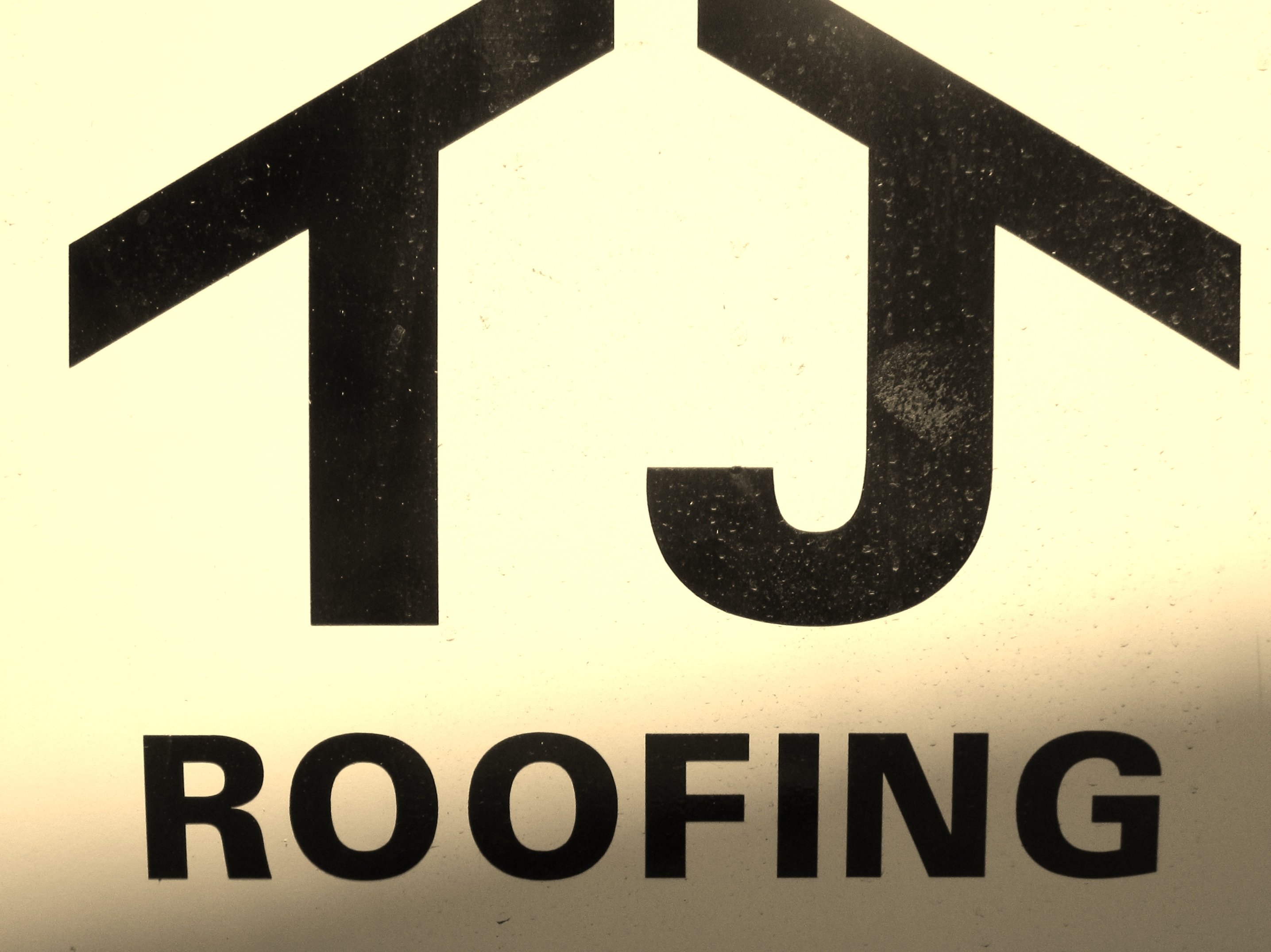 T J Roofing Logo