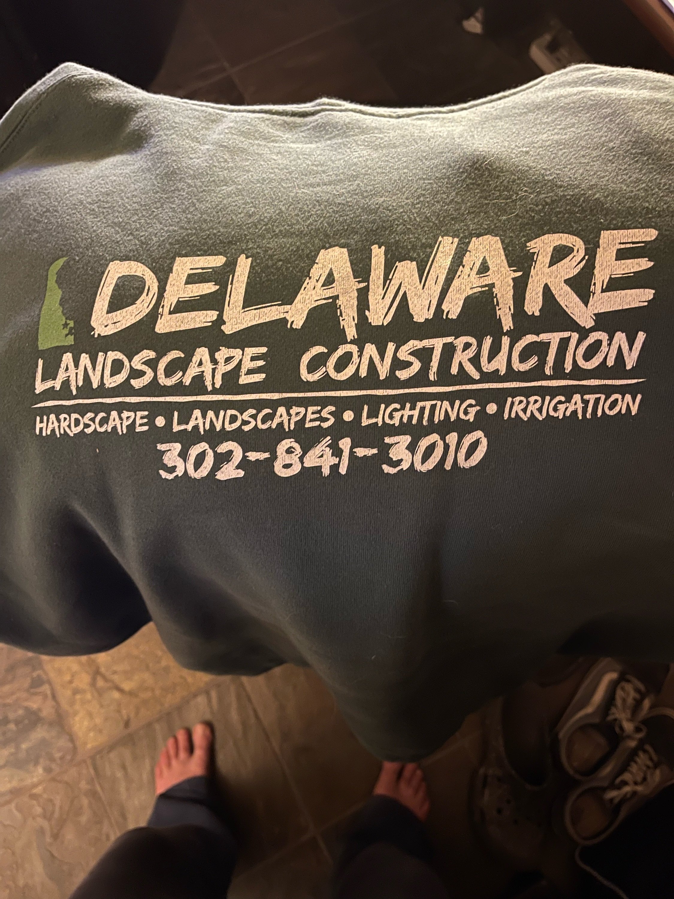Delaware Landscape Construction, LLC Logo
