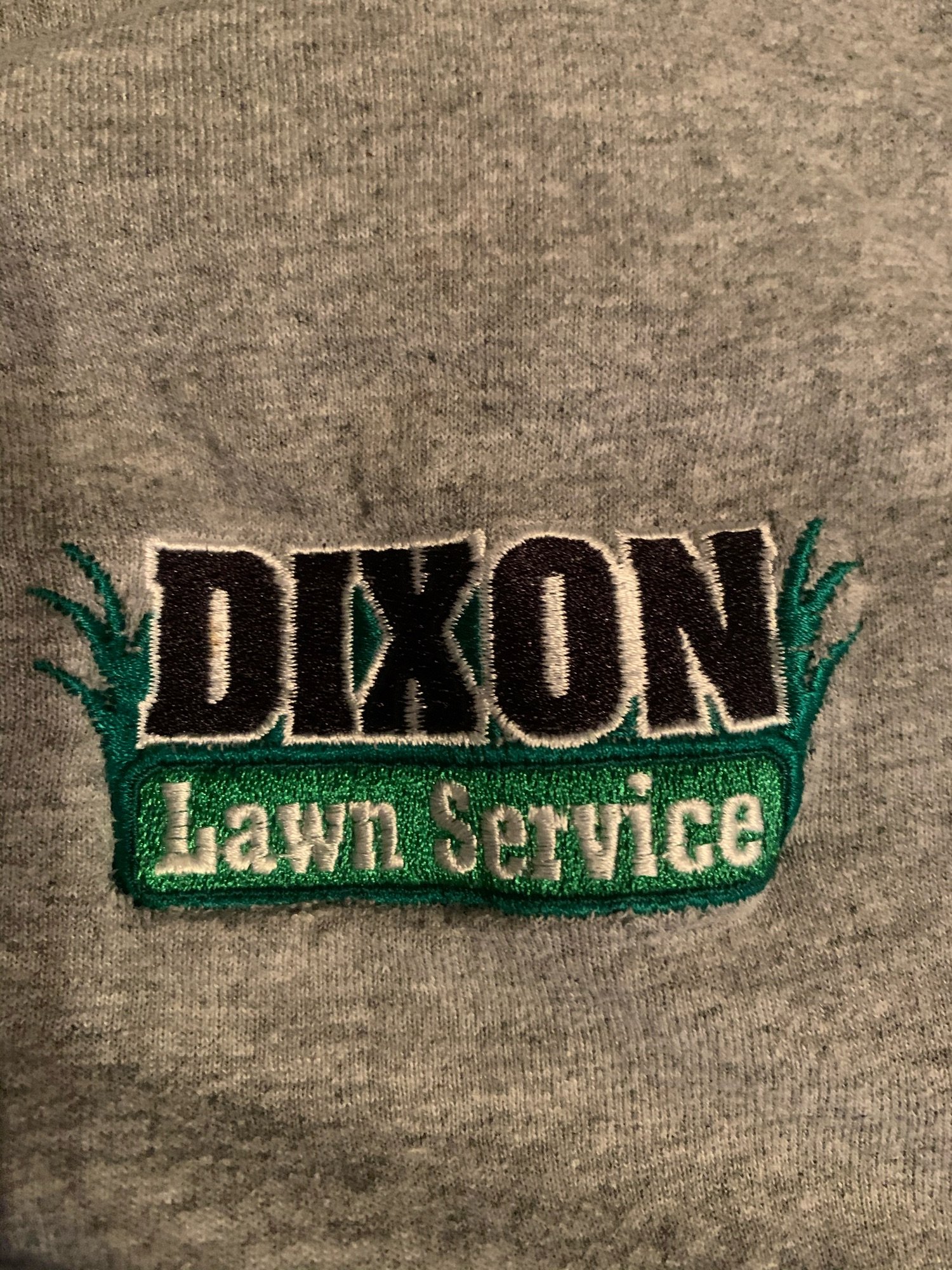 Dixon Lawn Service Logo