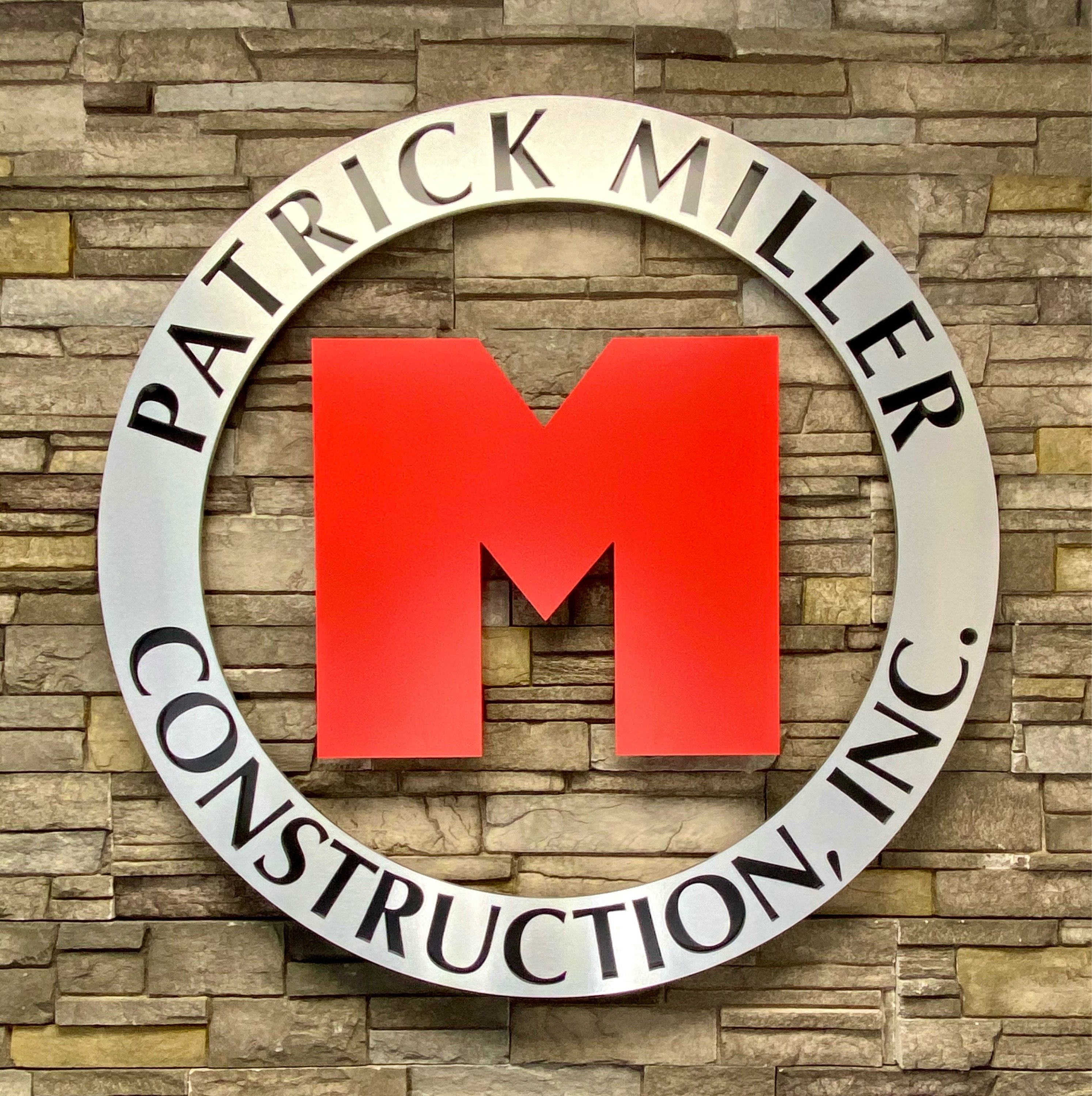 Patrick Miller Construction, Inc. Logo