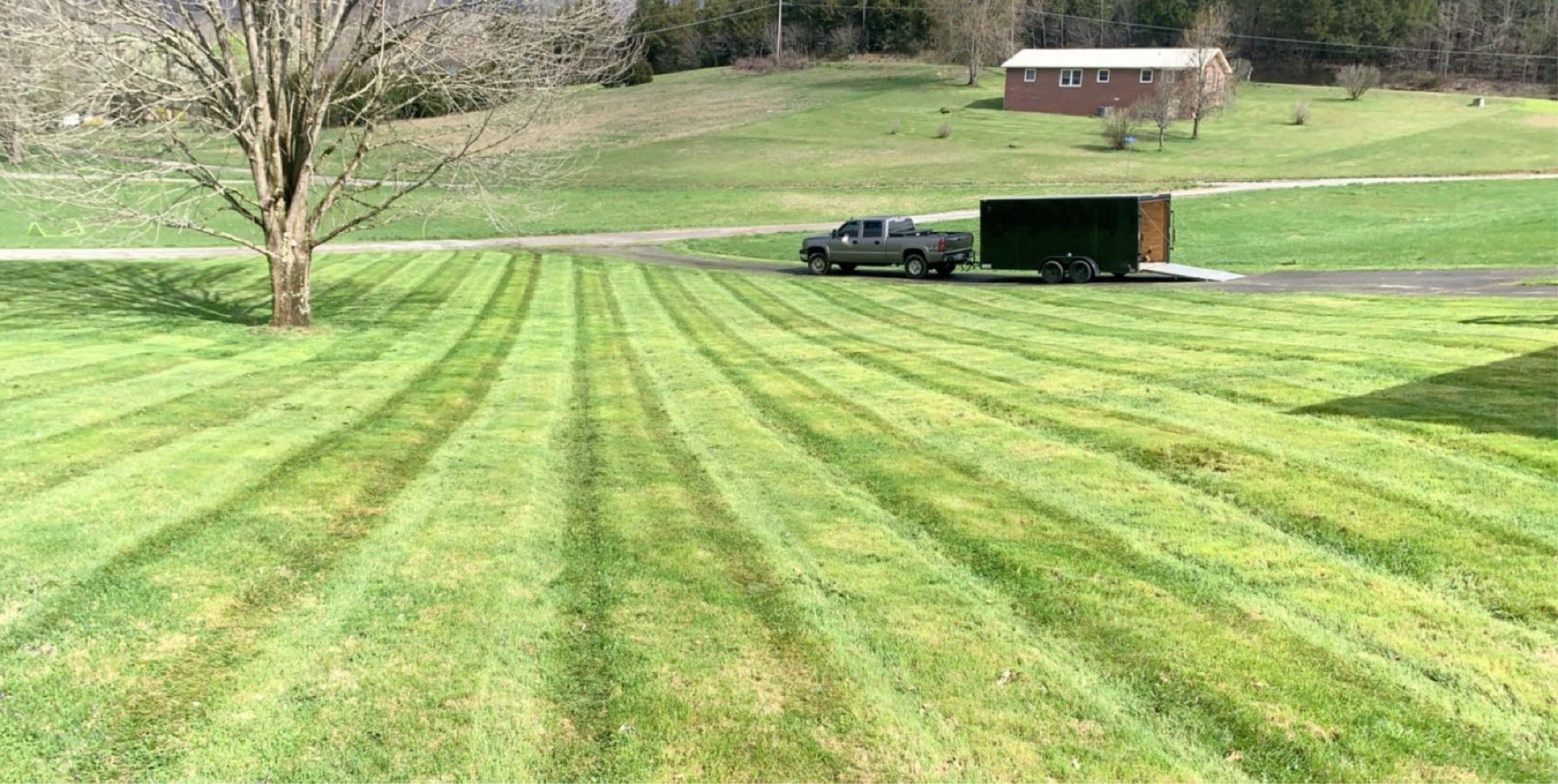 Sexton's Lawn Services Logo