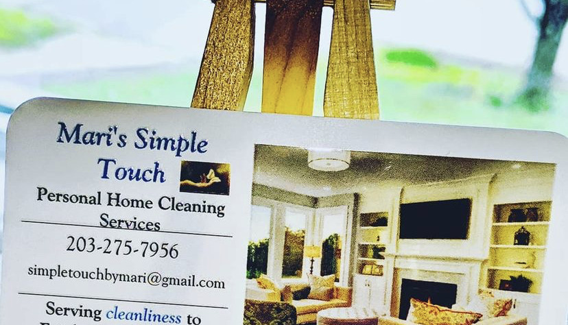 Mari's Simple Touch Home Cleaning Service Logo