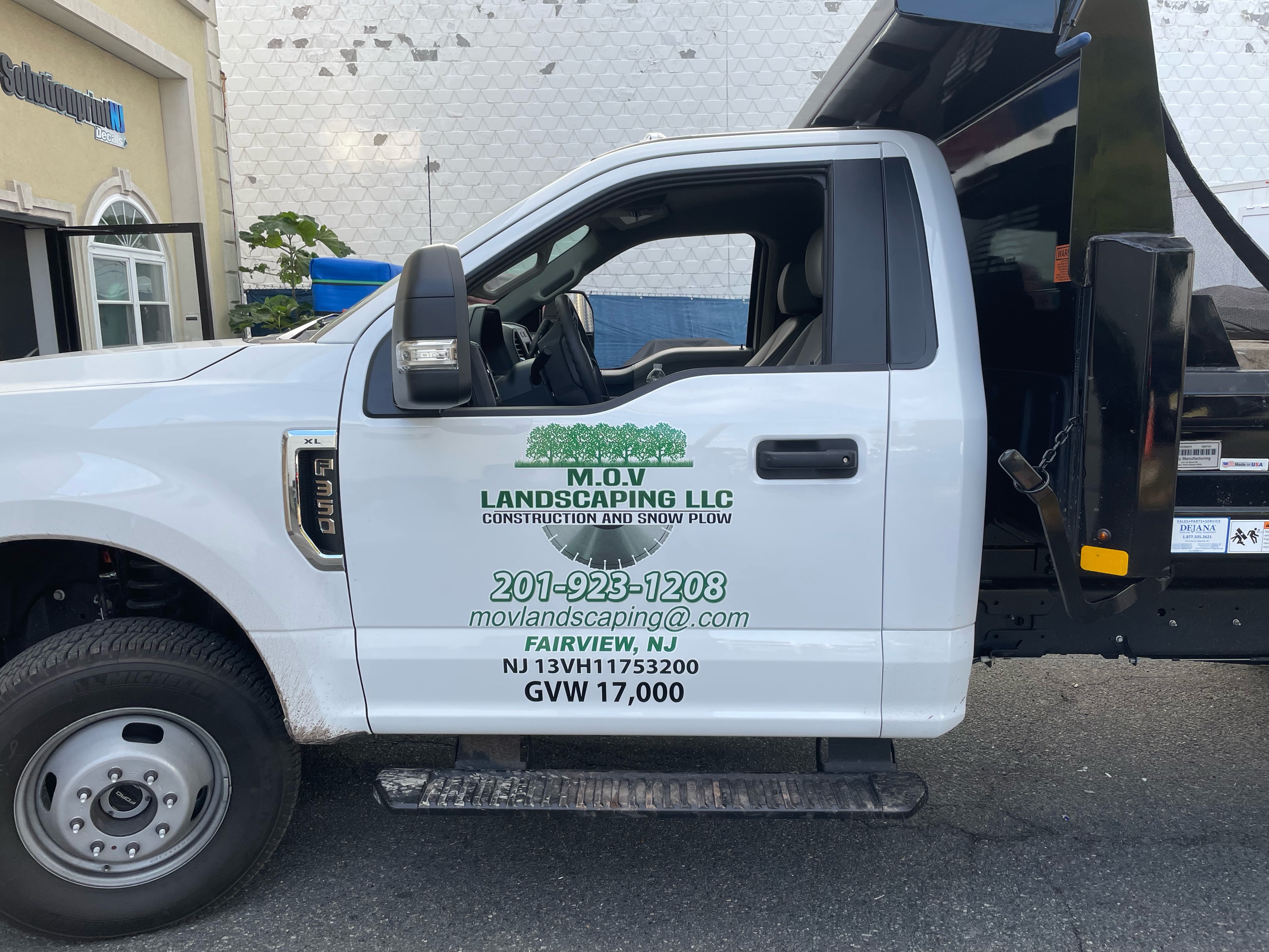MOV Landscaping Construction Logo