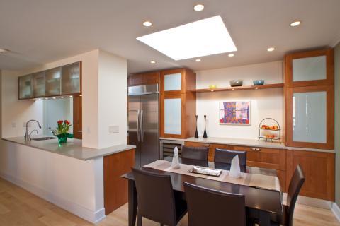 Contemporary Dining Room with dark brown leather furniture