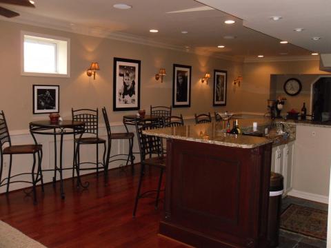 Traditional Basement with white wood paneled wall