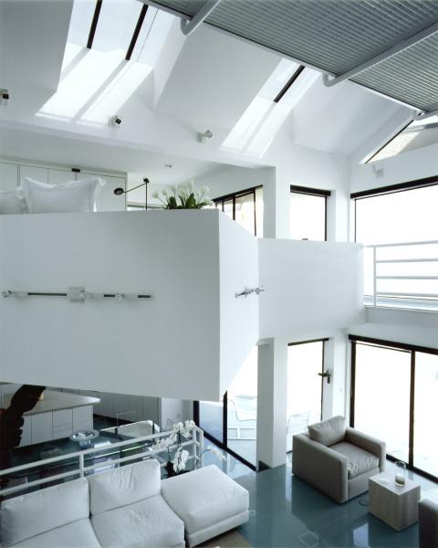 Contemporary Family Room with wall mounted spot lighting