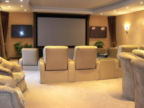 Traditional Home Theater with leather theater chairs