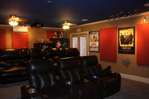 Contemporary Home Theater with black leather home theater chairs