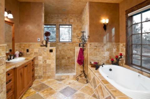Transitional Bathroom with large light wood framed vanity mirror