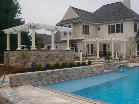Traditional Pool with outdoor dining table and chairs