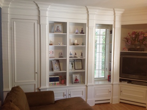 Traditional Sunroom with artificial flower arrangement