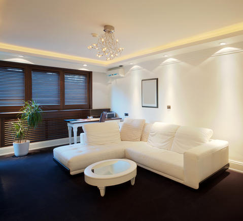 Modern Living Room with low white coffee table with mirrored top