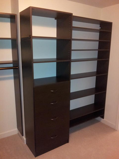 Traditional Closet with dark built in adjustable shelving