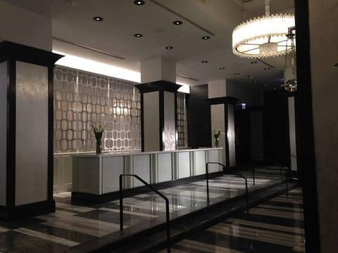 Modern Entry with black and white large pillars