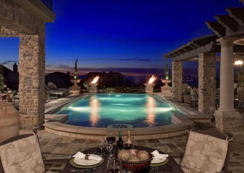 Traditional Pool with wood trellis over part of patio
