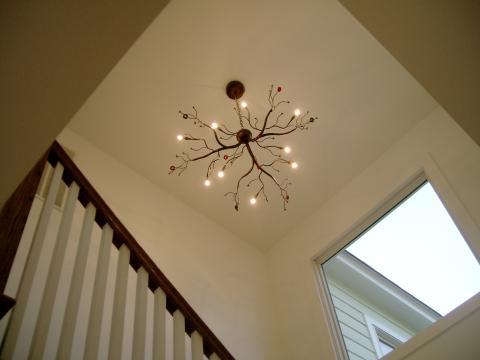 Modern Entry with free form chandelier