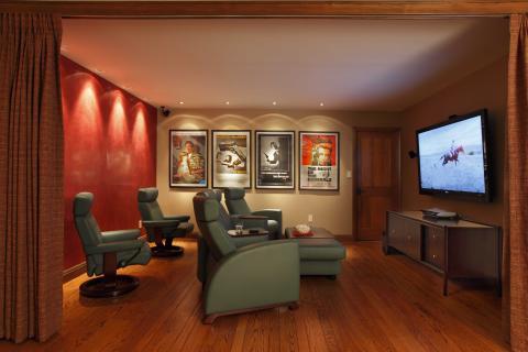 Contemporary Home Theater with vintage movie posters