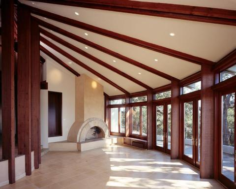 Contemporary Sunroom with glass and wood french doors