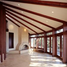 Contemporary Sunroom with glass and wood french doors
