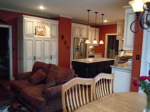 Eclectic Family Room with black iron lighting