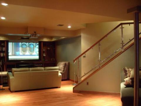 Traditional Home Theater with chrome and glass railing