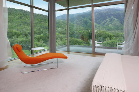 Modern Sunroom with floor to ceiling windows