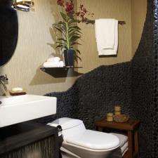 Eclectic Bathroom with silver wall hung vanity sconce lighting