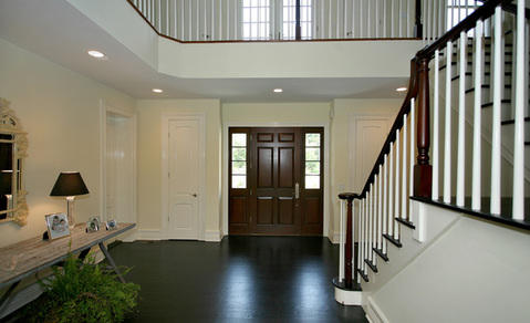 Traditional Entry with multi-level staircase