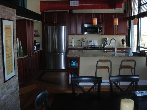 Eclectic Dining Room with black dining room furniture