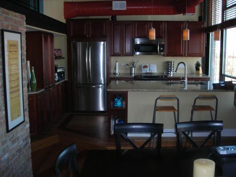 Eclectic Dining Room with black dining room furniture