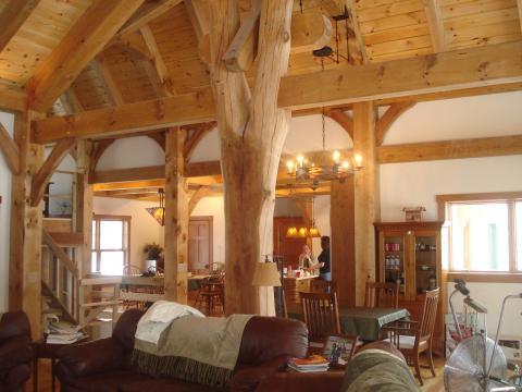 Transitional Family Room with dark wood dining table and chairs