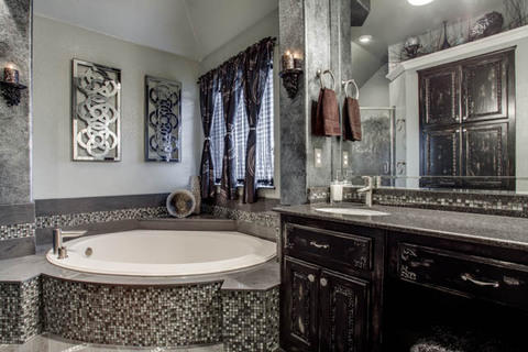 Eclectic Bathroom with distressed paint finish on cabinets