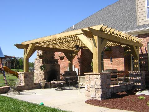 Traditional Patio with light wood trellis
