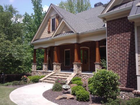 Eclectic Home Exterior with white framed windows and doors