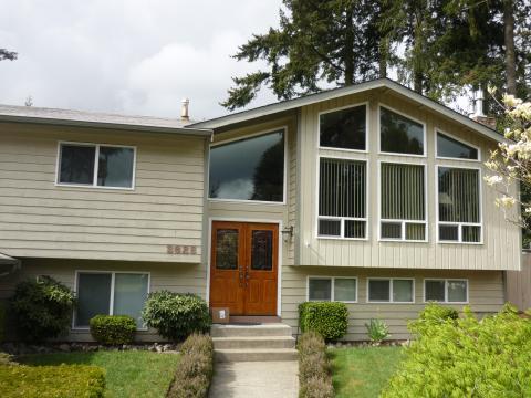 Traditional Home Exterior with vertical and horizontal siding