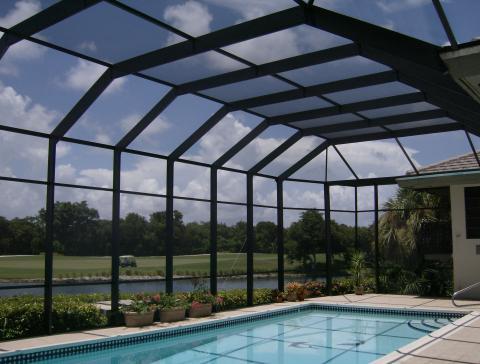 Contemporary Pool with glassed covered pool