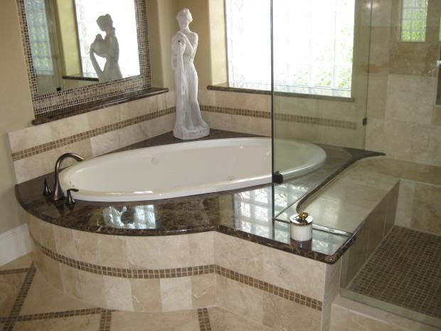 Traditional Master Bathroom with built in tile shower seat