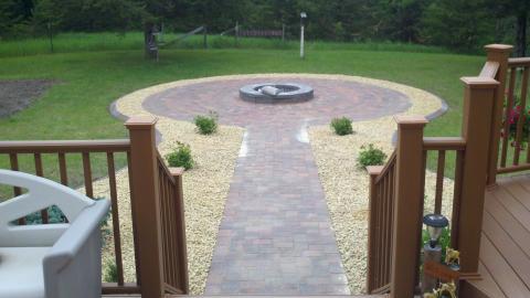 Transitional Landscape with cobblestone walkway