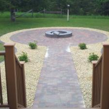 Transitional Landscape with brick paved walkway
