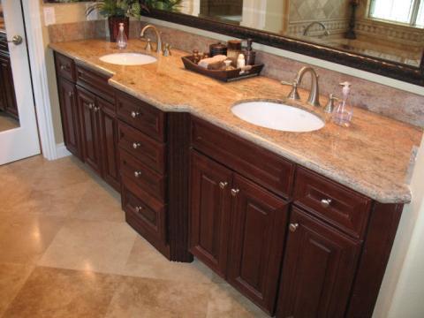 Traditional Bathroom with dark wood vanity cabinet