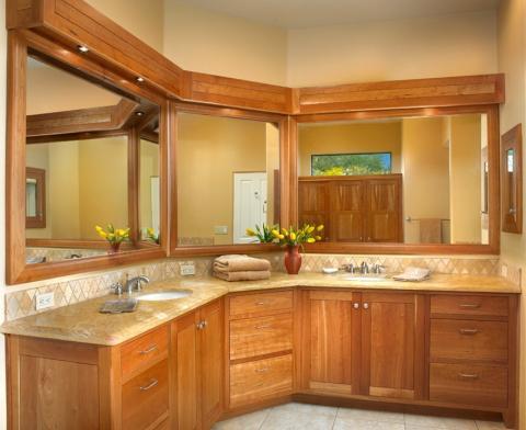 Traditional Master Bathroom with light wood framed vanity mirrors